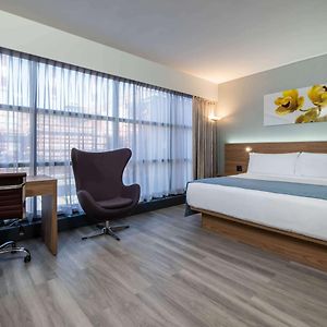 King Room Mobility or Hearing Access Roll Shower or Pet-Friendly Non-Smoking